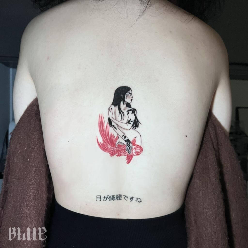 Woman With Koi Fish Tattoo